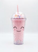 Kawaii tumbler with straw in pink, purple and blue cute face designs with pastel bead filled double wall and rainbow dome lid