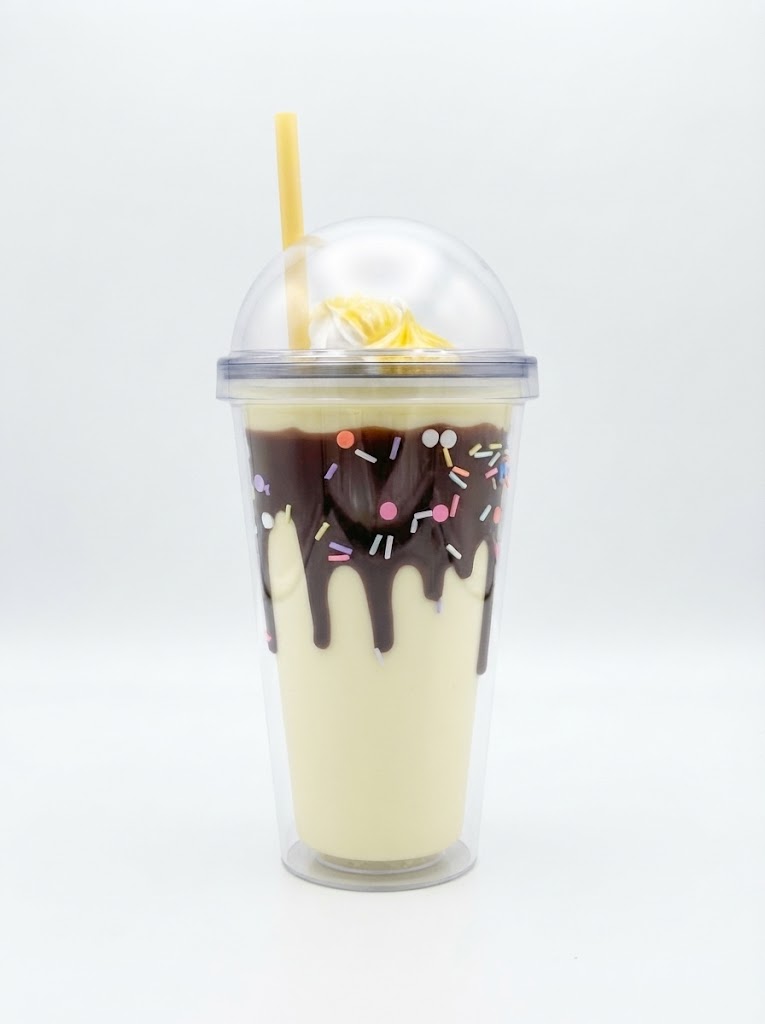 Milkshake Style Double Wall Plastic Tumbler with Straw and 3D Drip Sprinkles and Faux Whipped Cream Dome Lid for Cold Drinks - Yellow & Brown (1) Milkshake style double wall plastic tumbler with straw, 3D chocolate drip, colorful sprinkles and faux whipped cream under a clear dome lid